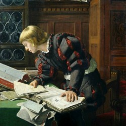 A young man researching some documents